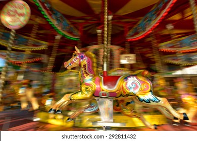 Motion Blur Of Vintage Horse Of Amusement Ride On Merry-go-round Carousel.  Amusement Concept. No People. Copy Space