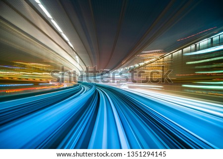 Motion blur from Yurikamome Line moving inside tunnel in Tokyo, Japan