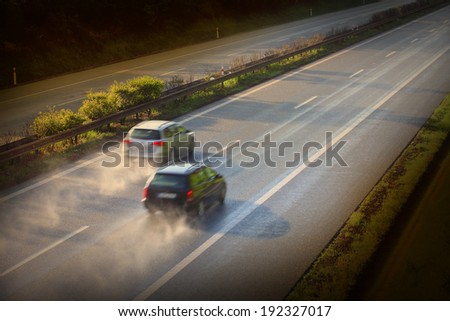 Motion blurred cars on the highway. Road safety concept.