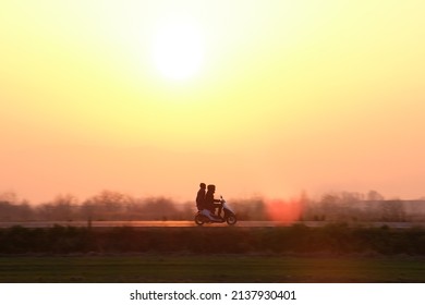 Motion Blurred Image Of Motorcycle Driving Fast On Evening Road. Kyiv, Ukraine - October 12, 2021.