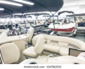 Motion Blurred Inside A Large Boat Dealer Selling Variety Of New And Used Boats Near Dallas, Texas, USA. Recreational Boating Buying, Trade-in And Servicing Concept