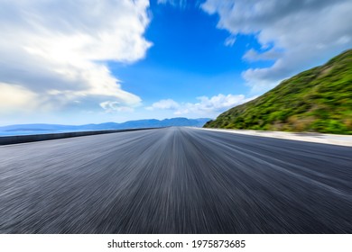 Motion Blurred Mountain Road Landscape.