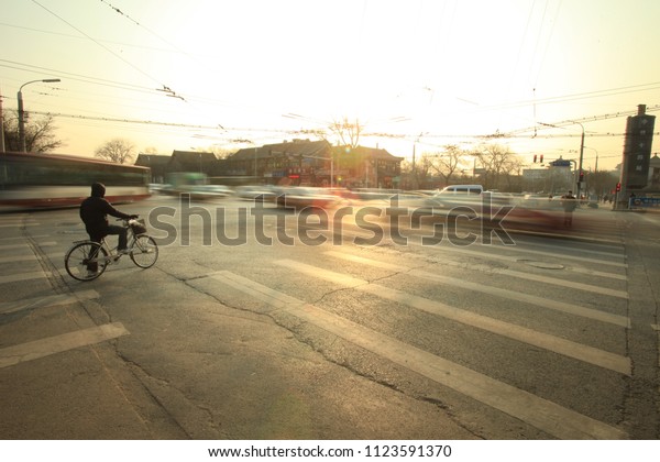 Motion blurred\
Pedestrian / car crosswalk\
