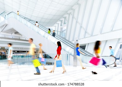 Motion Blurred People In The Shopping Mall