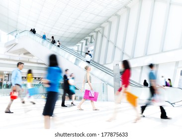 Motion Blurred People In The Shopping Mall