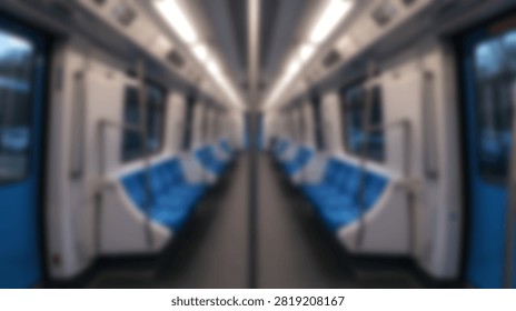 A motion blurred perspective view inside an empty metro train carriage showing rows of blue seats and overhead lights