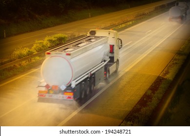 Motion Blurred Tanker Truck On The Highway. Chemical Industry And Pollution Concept.