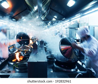 Motion Chefs In A Chinese Restaurant Kitchen.