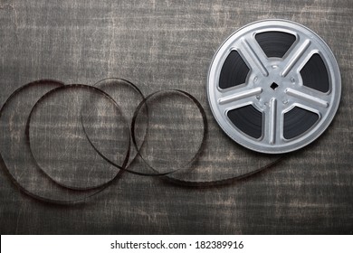 Motion Picture Film Reel On The Table