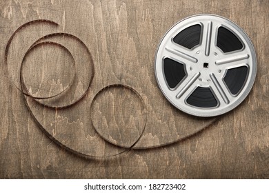 Motion Picture Film Reel On The Table