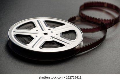 Motion Picture Film Reel On The Table