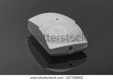 motion sensor isolated reflection on black background