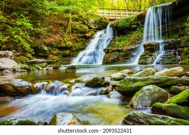 The motion-blurred waters of Diamond Notch Falls on the West Kill along Devil's Path in the Catskill Mountains of New York, is a welcoming site for hikers who climb the moderately difficult trail.   - Powered by Shutterstock