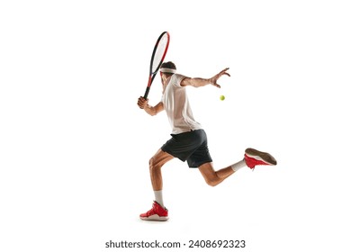 Motivated sportsman, tennis player during game, in motion with racket, playing isolated over white background. Concept of sport, hobby, active and healthy lifestyle, competition - Powered by Shutterstock