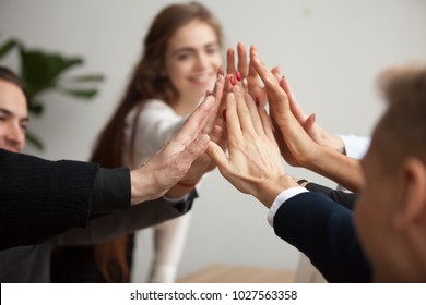 Motivated Successful Business Team Giving High Five, Happy Young Students Employees Group Join Hands With Senior Teacher Mentor, Team Building Unity Concept, Help Support In Teamwork, Close Up View