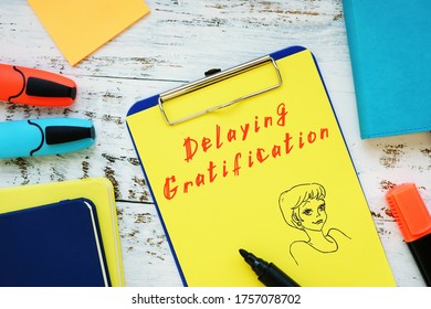 Motivation concept meaning Delaying Gratification with phrase on the piece of paper. - Shutterstock ID 1757078702
