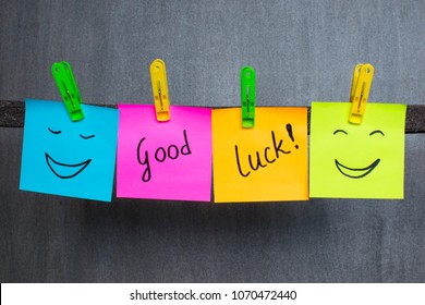 Motivation concept, notes with words Good luck on the dark background. - Shutterstock ID 1070472440