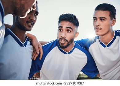 Motivation, football and team captain talking in a huddle planning match strategy for collaboration, teamwork and support. Group, discussion and soccer players in solidarity together for a game - Powered by Shutterstock