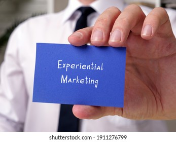  Motivational concept meaning Experiential Marketing with sign on the piece of paper.