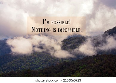 Motivational and inspirational quotes against blurred mountain view background with filler effect - I'm possible, Nothing is impossible. - Shutterstock ID 2156060923