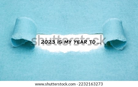 Motivational New Year 2023 resolutions list concept with headline 2023 is my year to written on paper. 