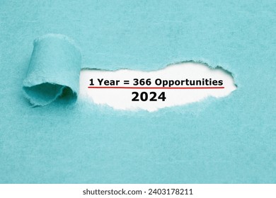 Motivational quote 1 Leap Year 2024 equal to 366 opportunities seen through a hole in ripped blue paper.