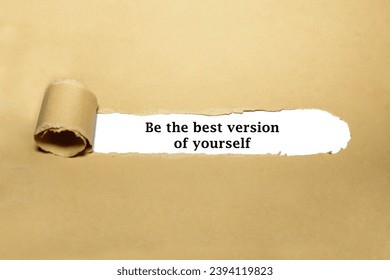 Motivational quote Be The Best Version Of Yourself appearing behind torn brown paper.