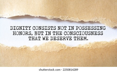 Motivational quote. Dignity consists not in possessing honors, but in the consciousness that we deserve them. - Shutterstock ID 2250814289