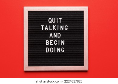 Motivational quote on black letter board on orange background. Don't ignore your own potential. Inspirational quote of the day.