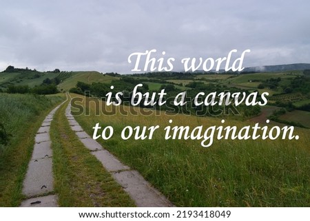 Motivational quote on nature background -  This world is but a canvas to our imagination.