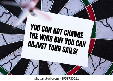 Motivational Quote You Can Not Change The Wind But You Can Adjust Your Sails.