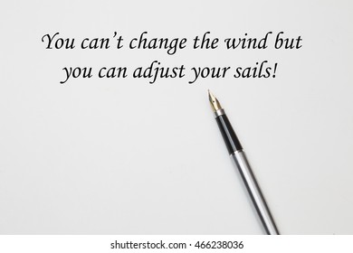 Motivational Quote You Can Not Change The Wind But You Can Adjust Your Sails, And Fountain Pen