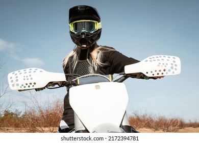 Motocross blondie. Female dirtbike rider. 