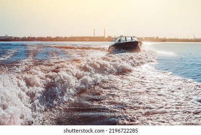 Motor Boat Breaking The Waves. Summer Vacation On The Water. Travel And Leasure Activities Concept