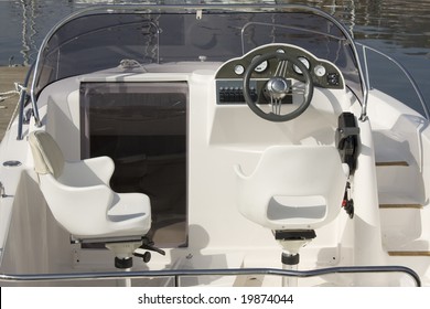 Motor boat cockpit with wheel and instruments