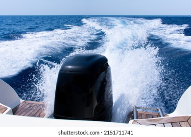 Motor Boat Engine Cuts Through The Water 