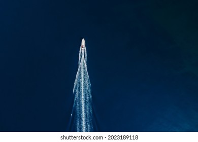 Motor boat is sailing in ocean. Aerial view - Powered by Shutterstock