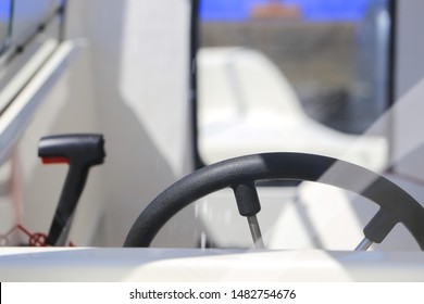 Motor Boat Steering Wheel With Throttle Control In Cockpit