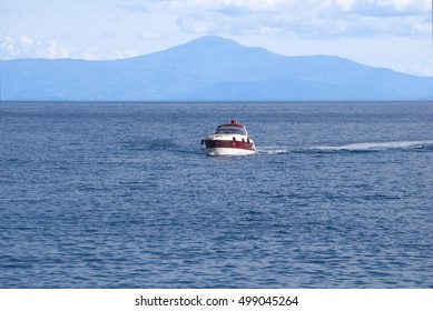 Motor boat while sailing open sea