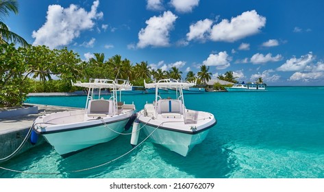 Motor boats for excursions and snorkeling.Tropical beach in Maldives. Travel and tourism to luxury resorts in the Maldives islands. Summer holiday concept