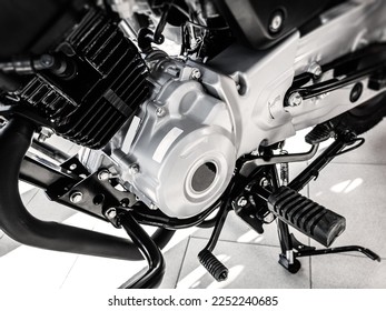 motor of brand new cross-country enduro motorcycle, black white, closeup