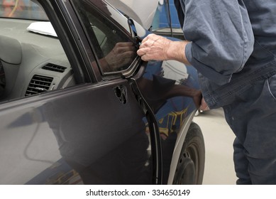 Motor Car Is Repaired At A Body Repair Shop