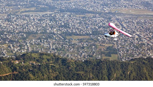 Motor Hang-gliding In Flight Over The City Of Pokhara - Nepal, Himalaya