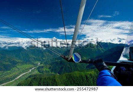 The motor hang-gliding in the sky - Nepal