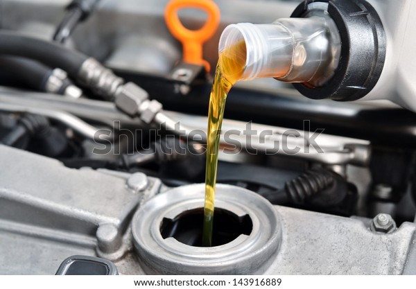 Motor oil, car engine close\
up