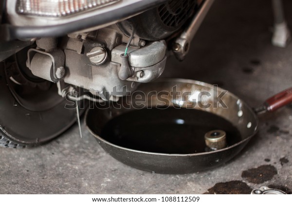 Motor oil, engine oil, or engine lubricant\
transfer change old to new by use a pan \
