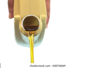 Motor Oil Pouring On White Background