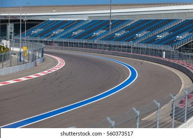 Motor Racing Track. Turning Asphalt Road With Marking Lines