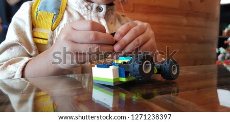 Motor skills developing by bricks model