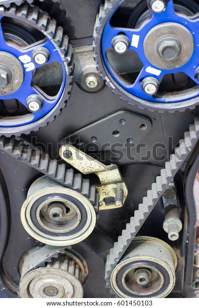 Motor and two pulleys CAMSHAFT TIMING. With belt\
transmission of rotation